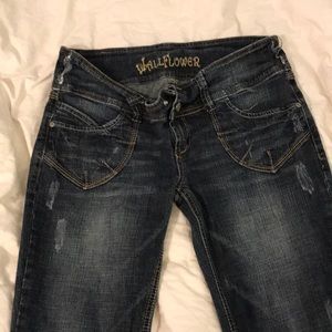 Cute dark low rise jeans. They are boot cut.